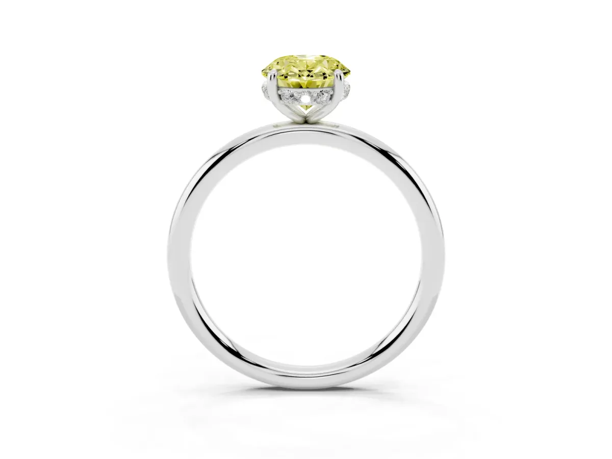 Fancy Yellow Oval Cut Solitaire Diamond Ring with a Classic Band and Four-Prong Setting Silver
