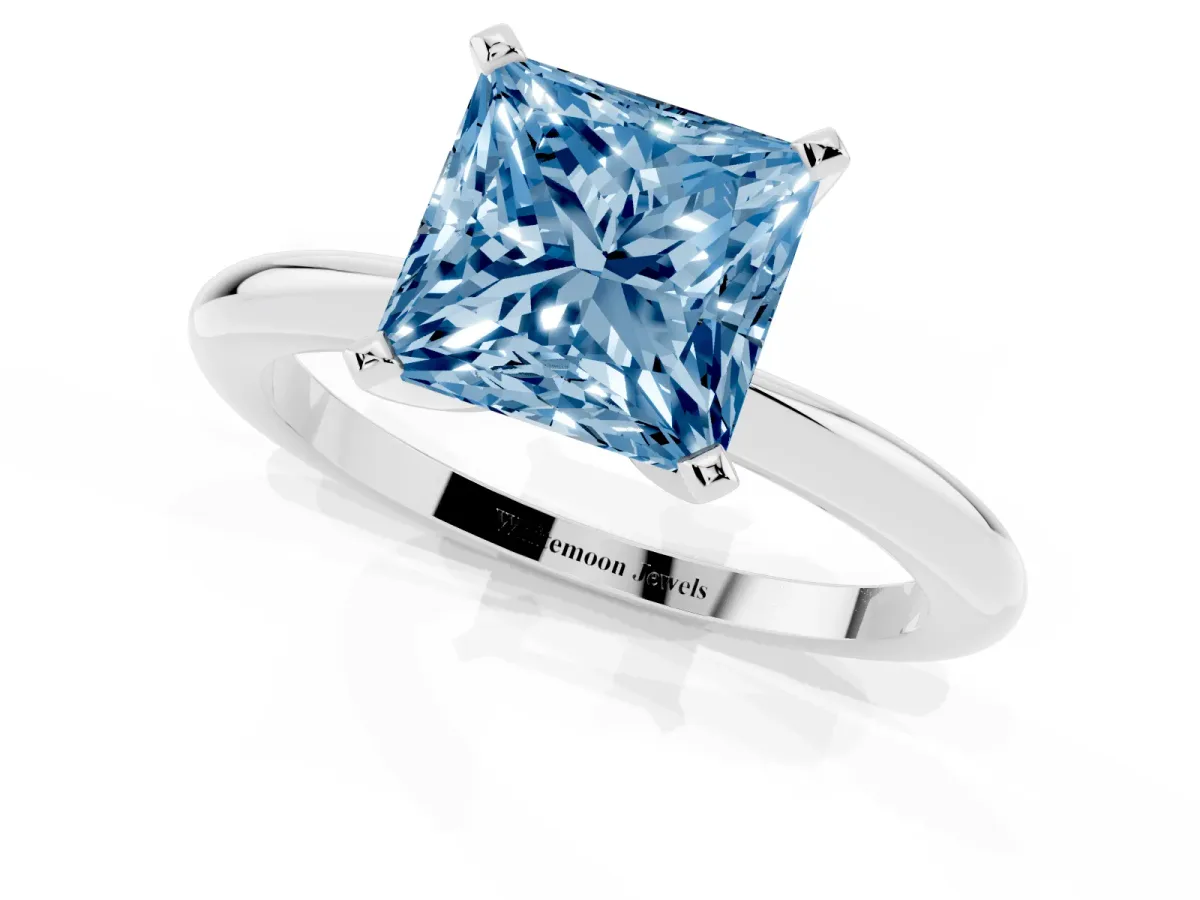 Fancy Blue Princess Cut Diamond Solitaire Ring with Prong Setting and Classic Band Platinum