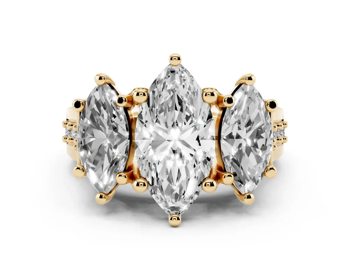 Marquise Cut Diamond Three-Stone Ring with Channel Set Band and Four-Prong Setting Yellow gold