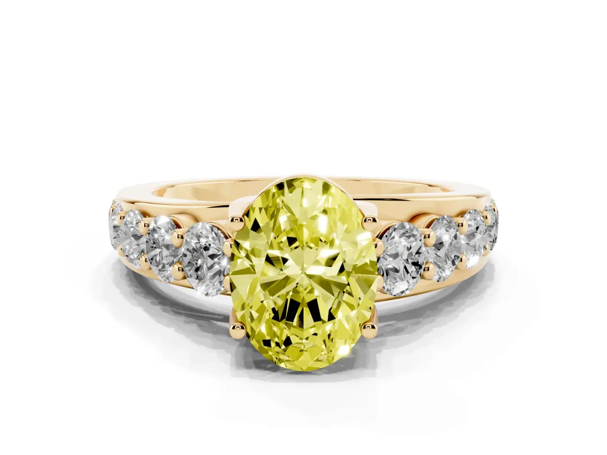Fancy Yellow Oval Cut Diamond Engagement Ring with Pavé Band and Four-Prong Setting Yellow gold