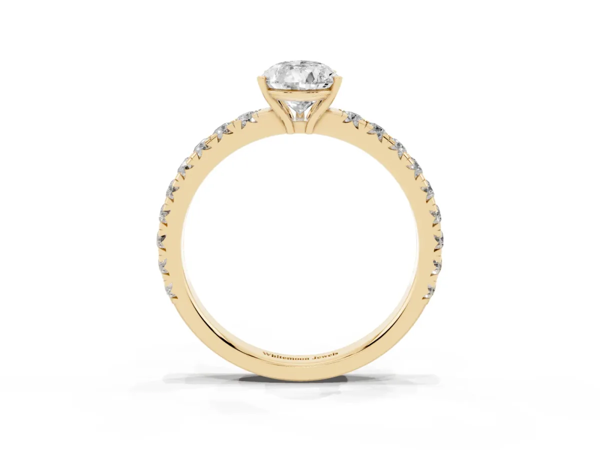 Pear Cut Diamond Pavé Solitaire Engagement Ring with Four-Prong Setting Yellow gold