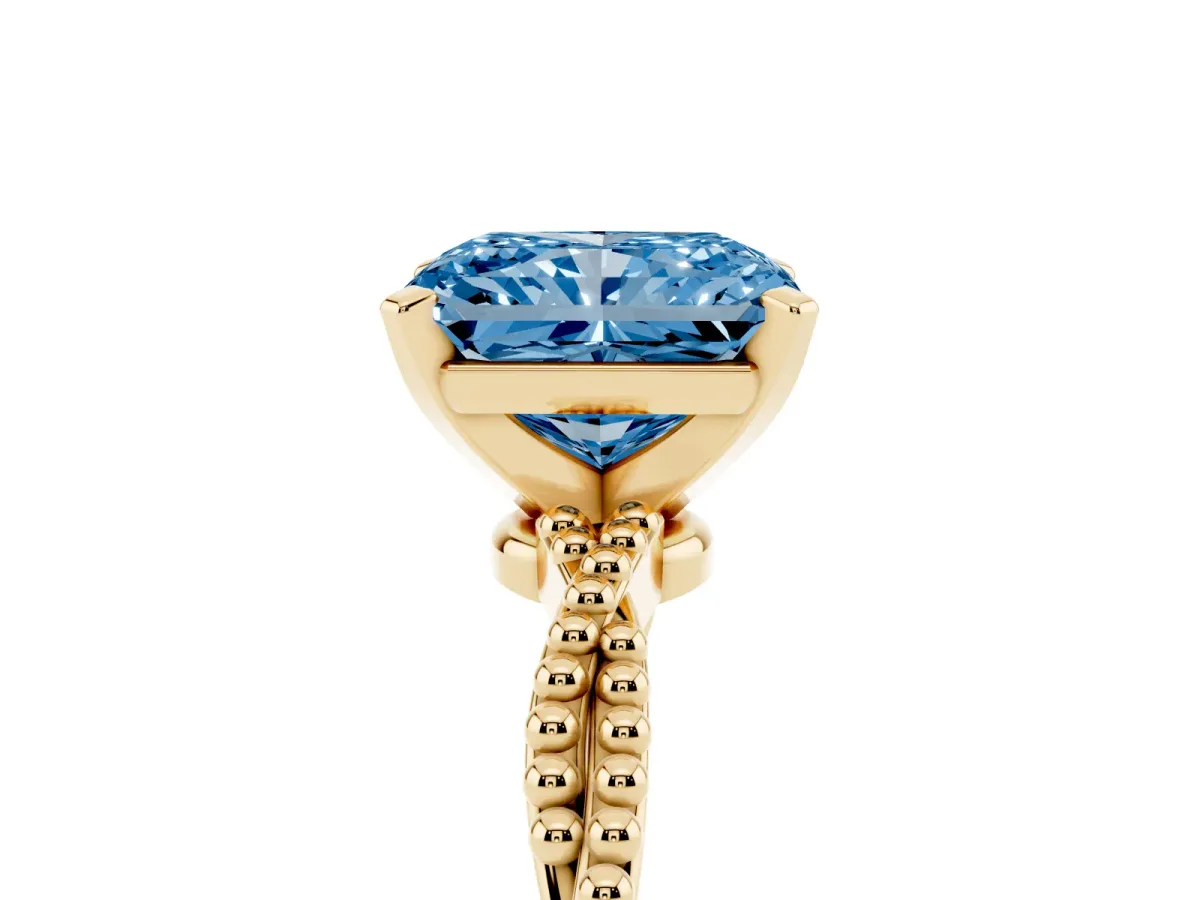 Fancy Blue Radiant Cut Solitaire Twisted Band with Bead Prong Setting Yellow gold