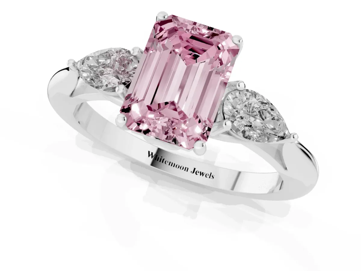 Fancy Pink Three-Stone Emerald Cut Brilliant Diamond Solitaire Ring with Tapered Band and Four-Prong Setting Silver