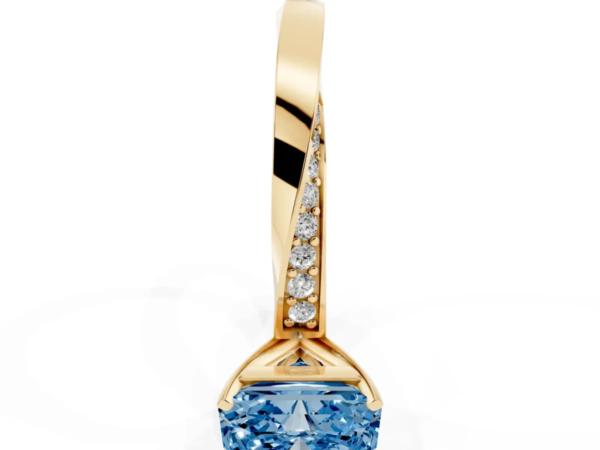 Fancy Blue Radiant Cut Diamond Engagement Ring with Side Stone Accents and Four-Prong Setting Yellow gold