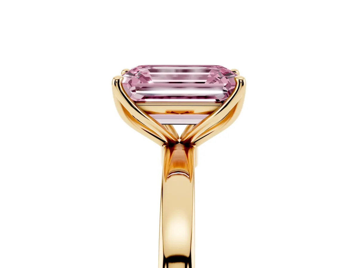 Fancy Pink Emerald Cut Diamond Solitaire Ring with Thin Band and Prong Setting Yellow gold