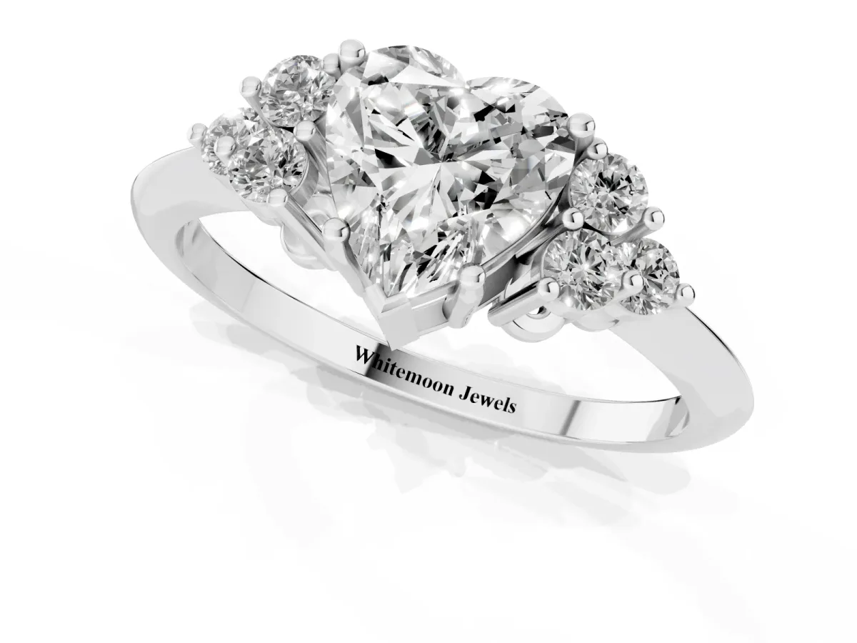 Heart Cut Cut Diamond Cluster Ring with Solitaire Band and Four-Prong Setting Silver