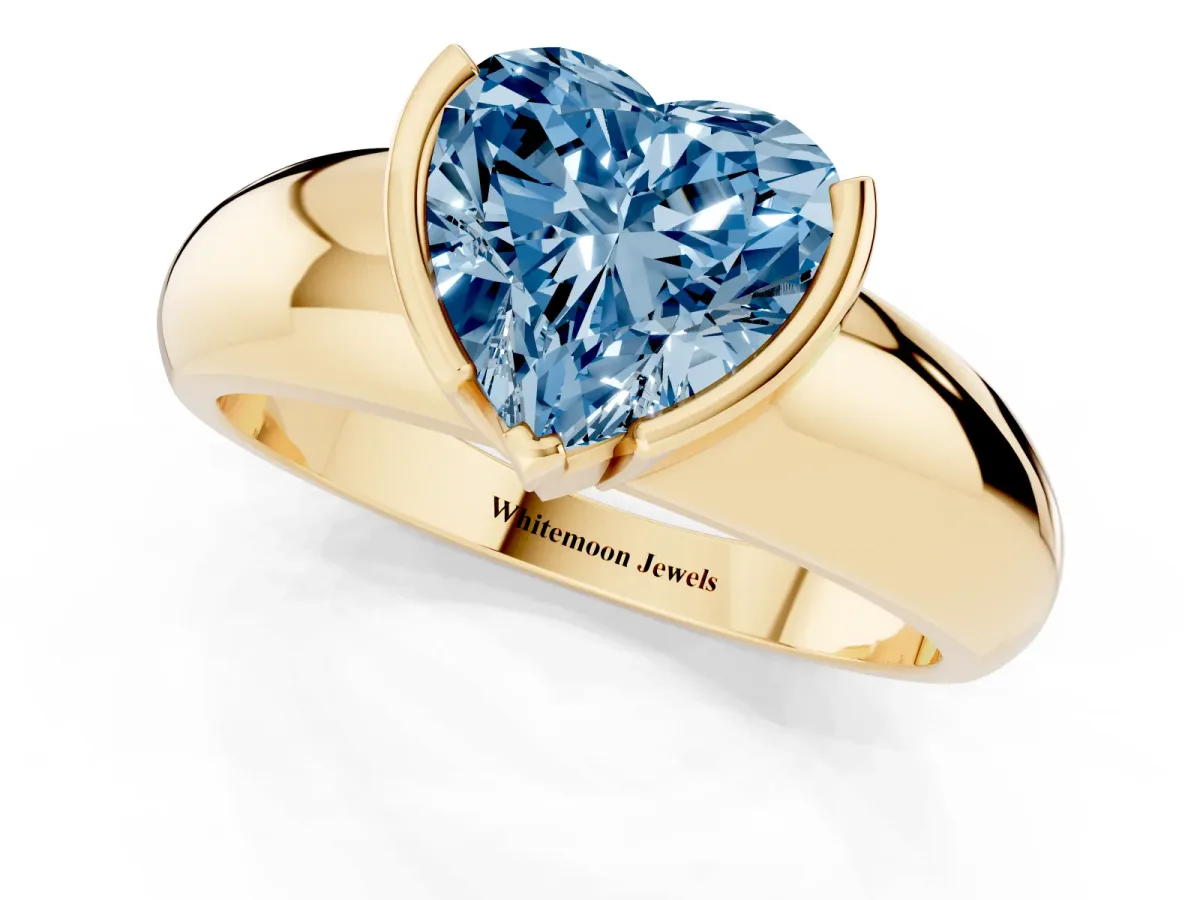 Fancy Blue Heart Cut Solitaire Tension Set Diamond Ring with Wide Band Yellow gold