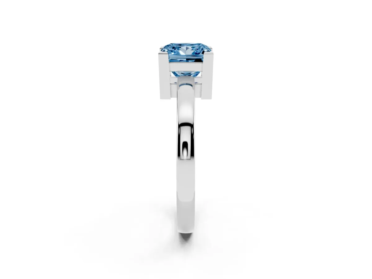 Fancy Blue Princess Cut Cut Solitaire Ring with Four-Prong Setting and Classic Band Silver