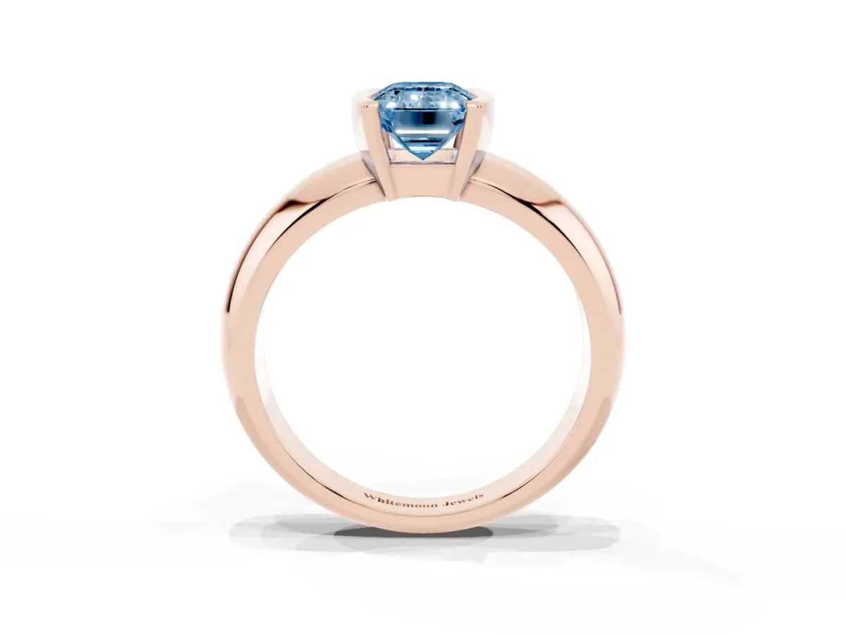 Fancy Blue Emerald Cut Solitaire Tension Set Diamond Ring with Wide Band Rose gold