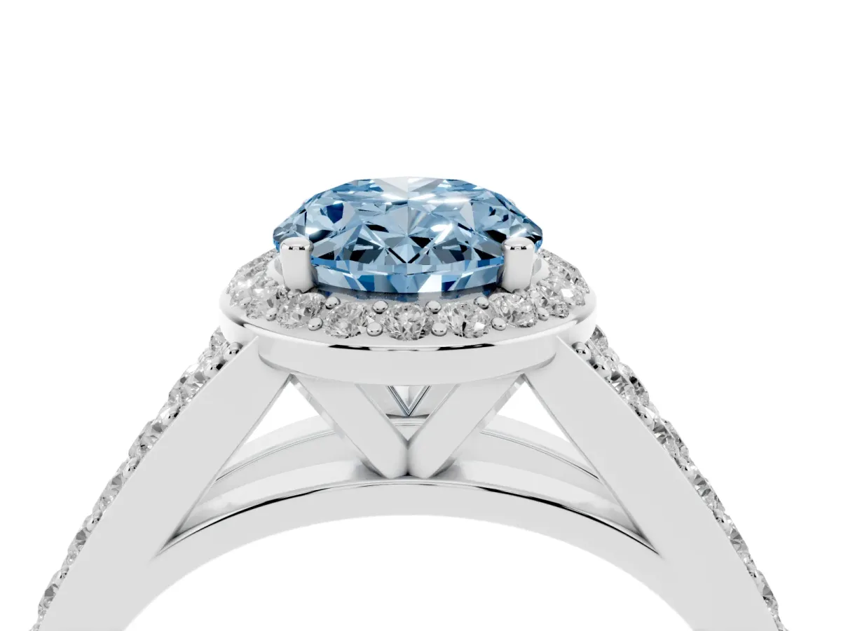 Fancy Blue Oval Cut Diamond Split Shank Halo Ring with Four-Prong Setting Silver