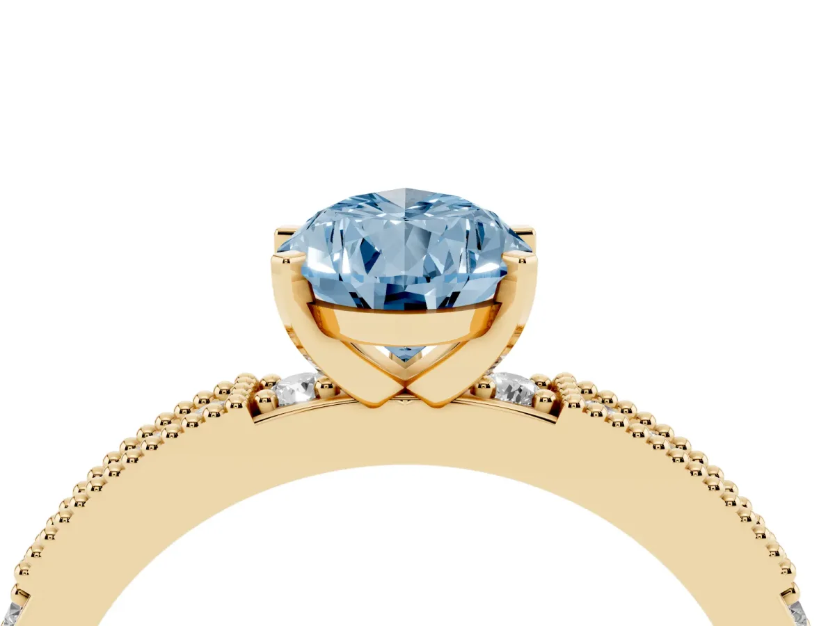 Fancy Blue Pear Cut Solitaire with Pavé Band and Four-Prong Setting Yellow gold