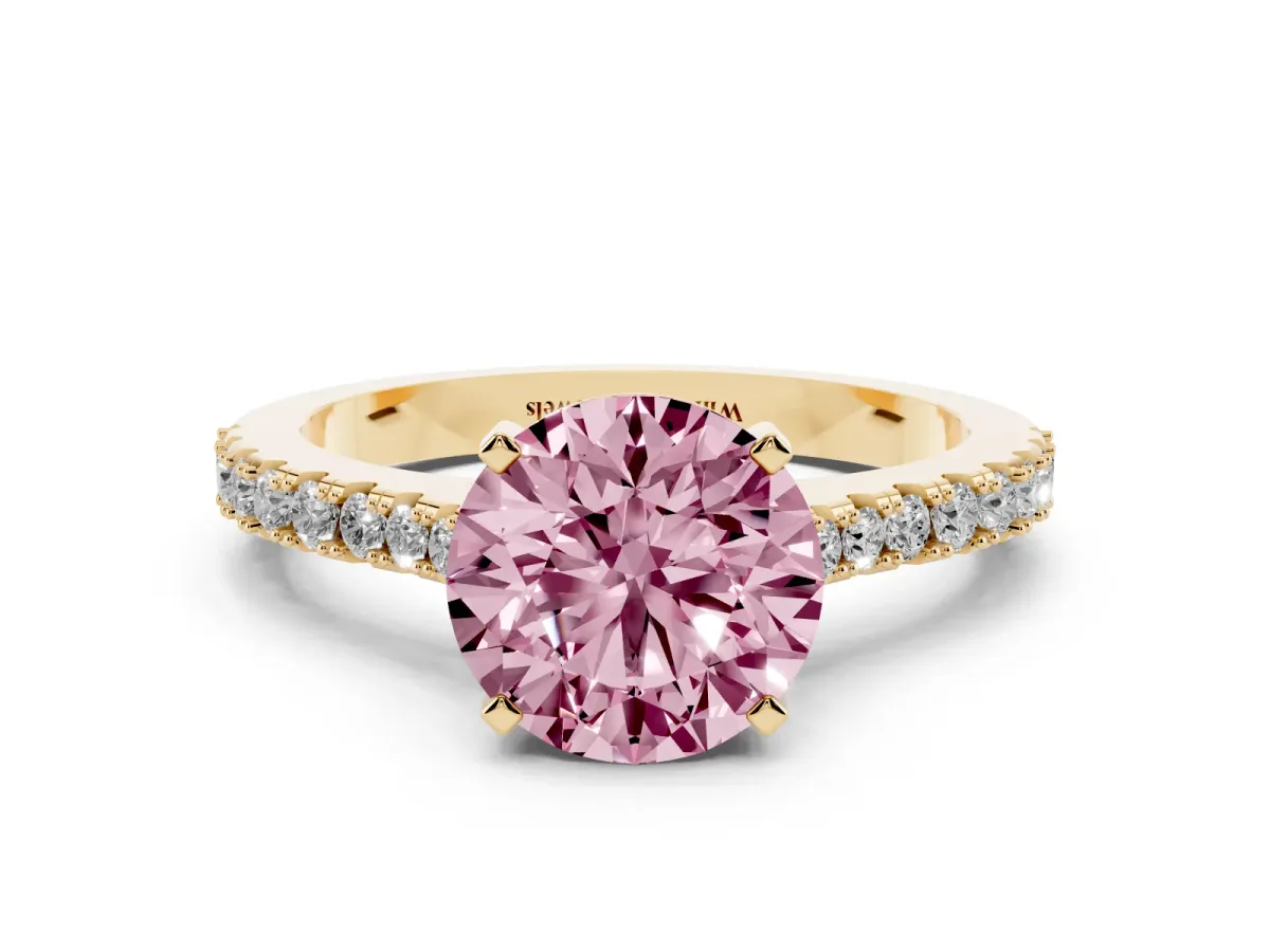 Fancy Pink Round Cut Cut Solitaire Diamond Engagement Ring with Pave Band and Four-Prong Setting Yellow gold