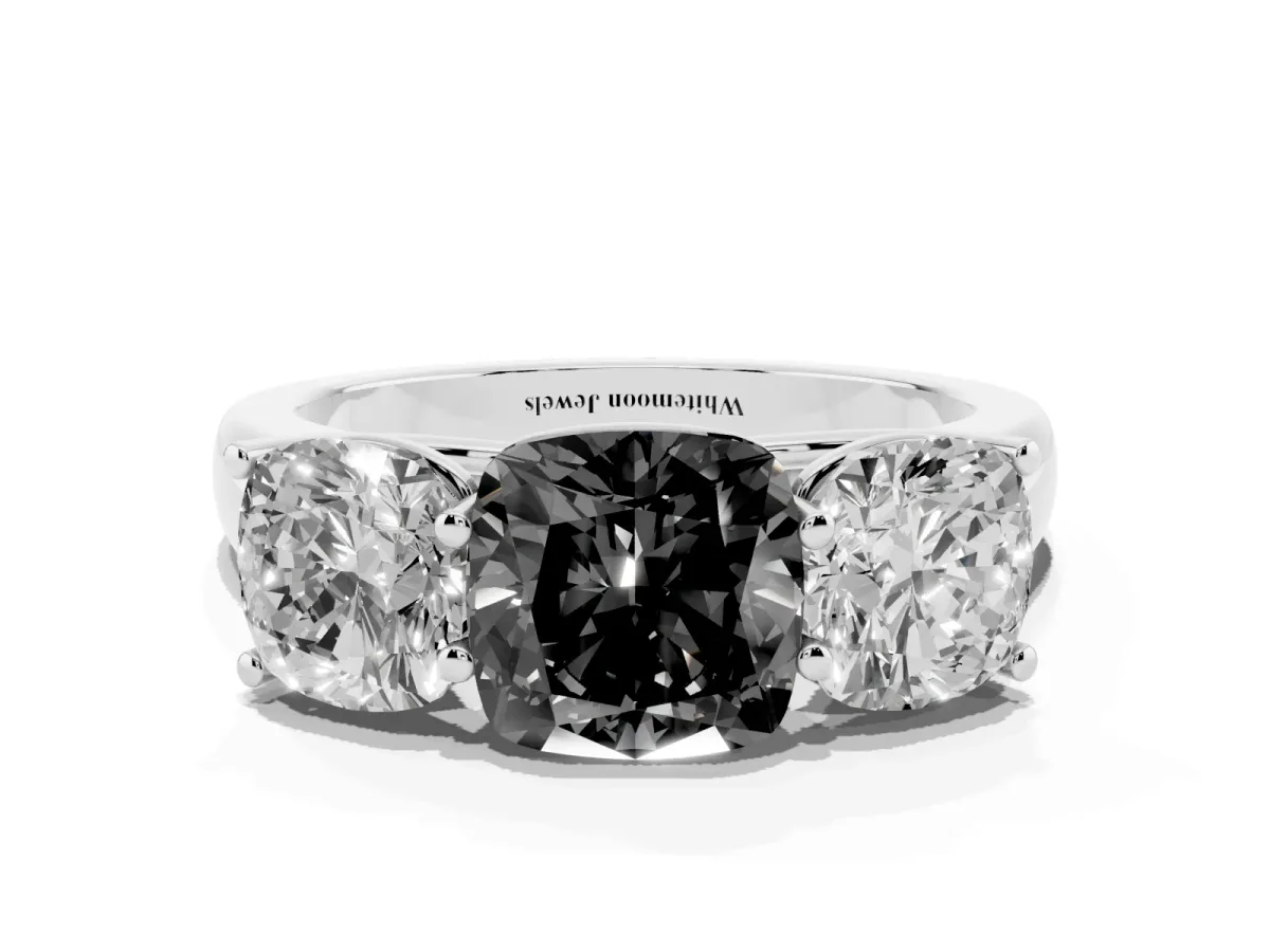 Fancy Black Cushion Cut Three-Stone Diamond Ring with Prong Setting on a Classic Band Platinum