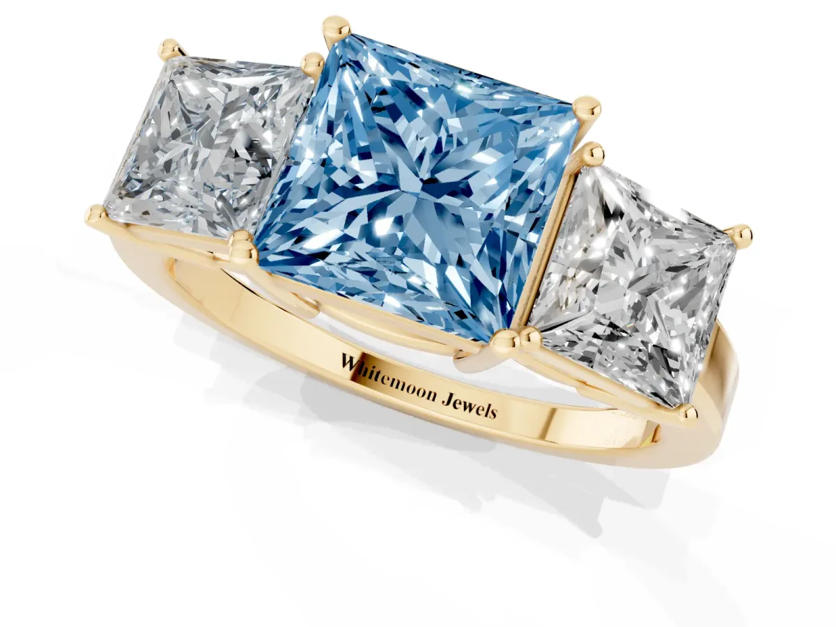 Fancy Blue Three-Stone Princess Cut Cut Diamond Engagement Ring with Flat Band and Four-Prong Setting Yellow gold