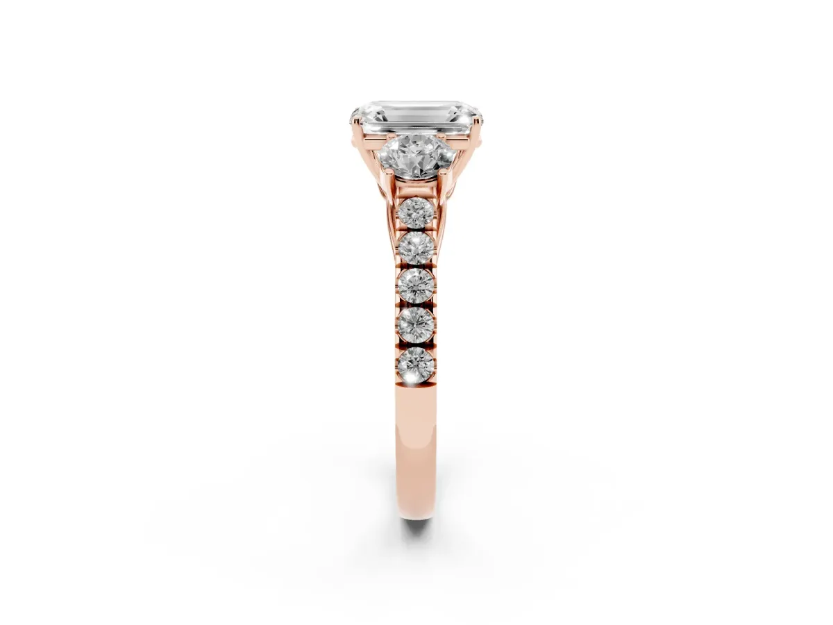 Emerald Cut Cut Diamond Three-Stone Ring with Round Side Stones and Pavé Band Rose gold