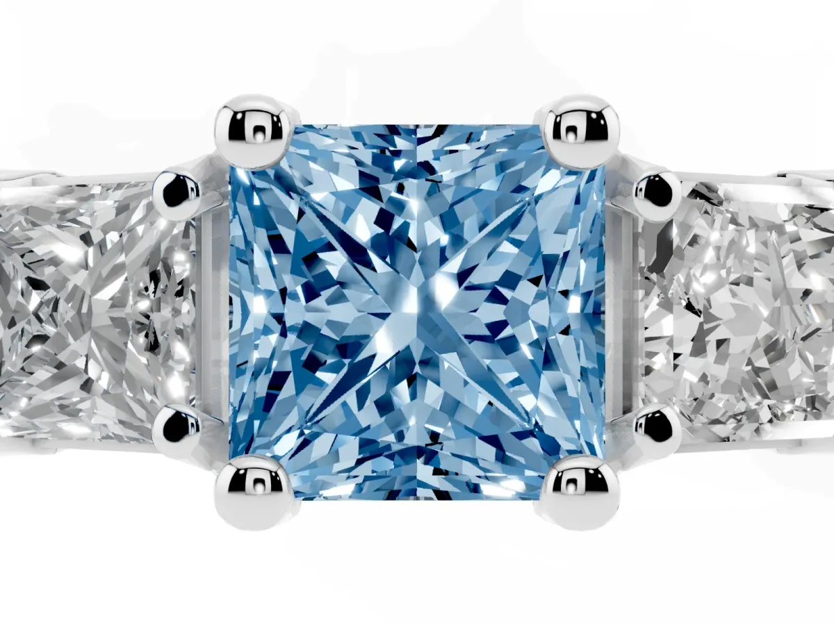 Fancy Blue Princess Cut Diamond Three-Stone Ring with Channel Set Band and Four-Prong Setting Silver