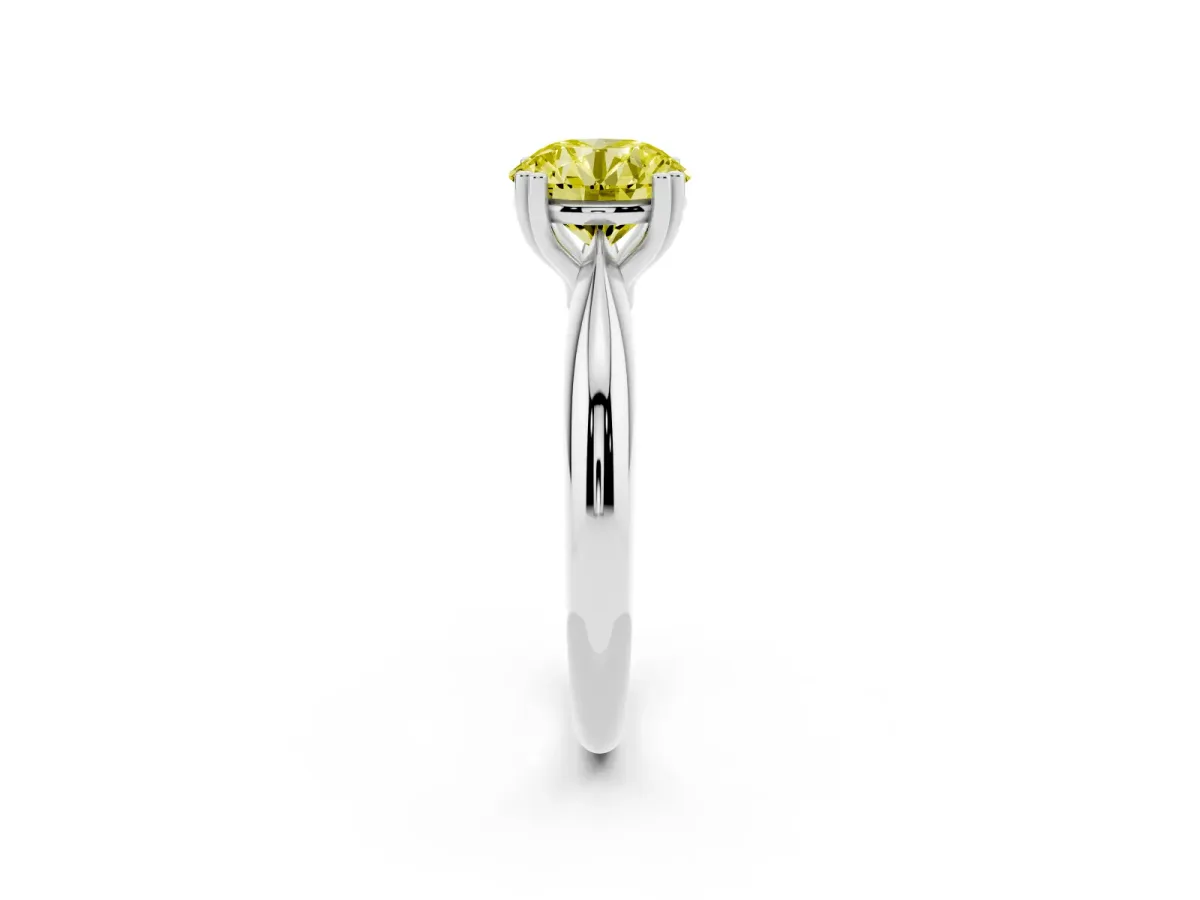 Fancy Yellow Round Cut Cut Solitaire Engagement Ring with Tapered Band and Four-Prong Setting Silver