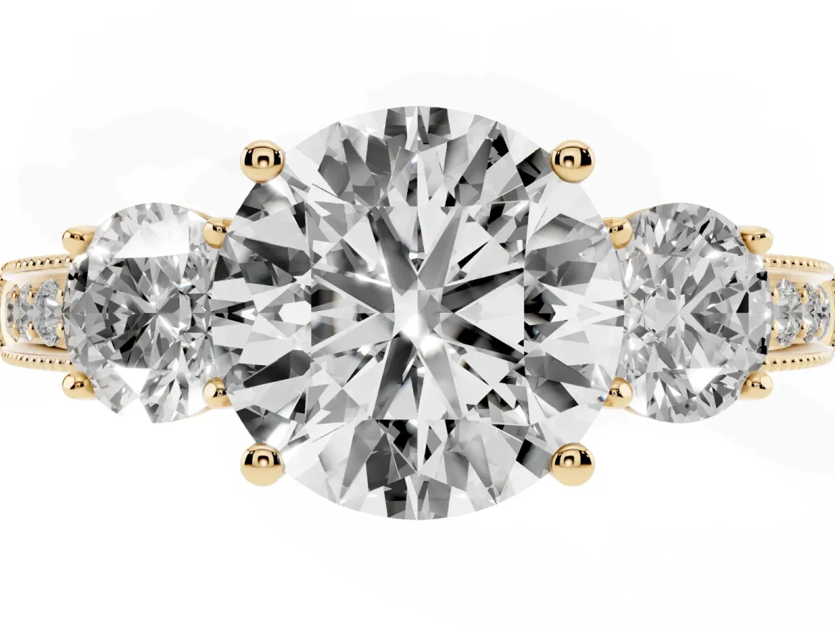 Round Cut Three-Stone Diamond Ring with Pavé Band and Four-Prong Setting Yellow gold