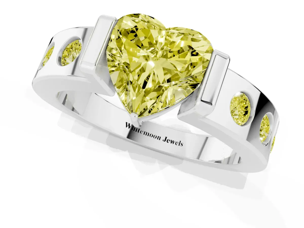 Fancy Yellow Heart Cut Brilliant Channel-Set Diamond Ring with Bezel Prong Setting Platinum
