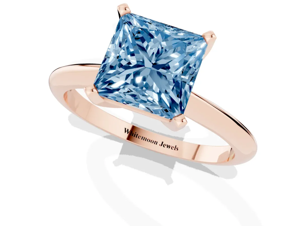 Fancy Blue Princess Cut Cut Solitaire Ring with Four-Prong Setting on a Classic Band Rose gold