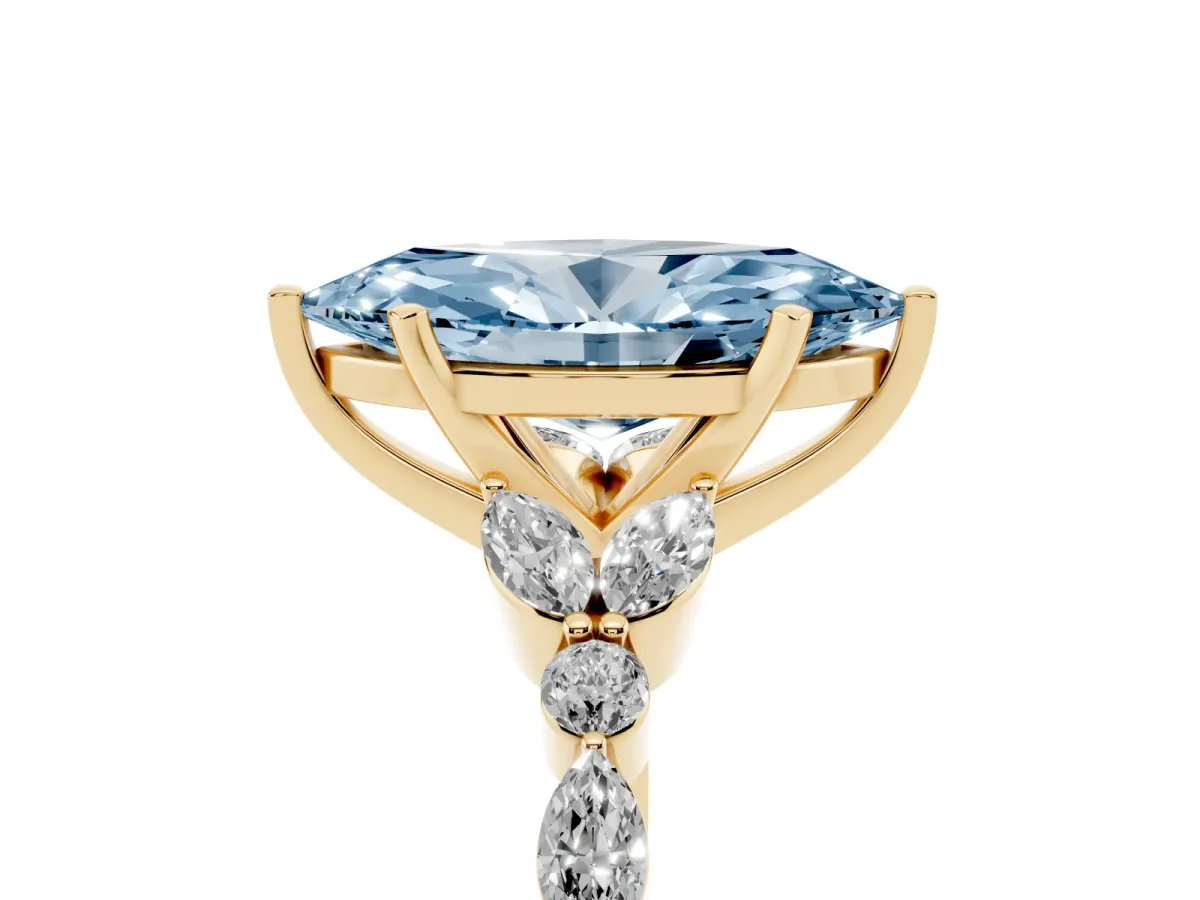 Fancy Blue Marquise Cut Diamond Solitaire Ring with Side Stones and Four-Prong Setting Yellow gold