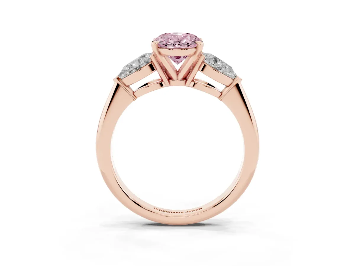 Fancy Pink Three-Stone Oval Cut Diamond Ring with Pear Side Stones and Four-Prong Setting Rose gold