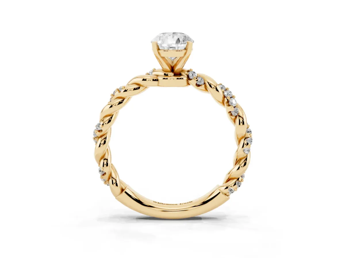 Pear Cut Diamond Solitaire Ring with Twisted Band and Pavé Accents Yellow gold