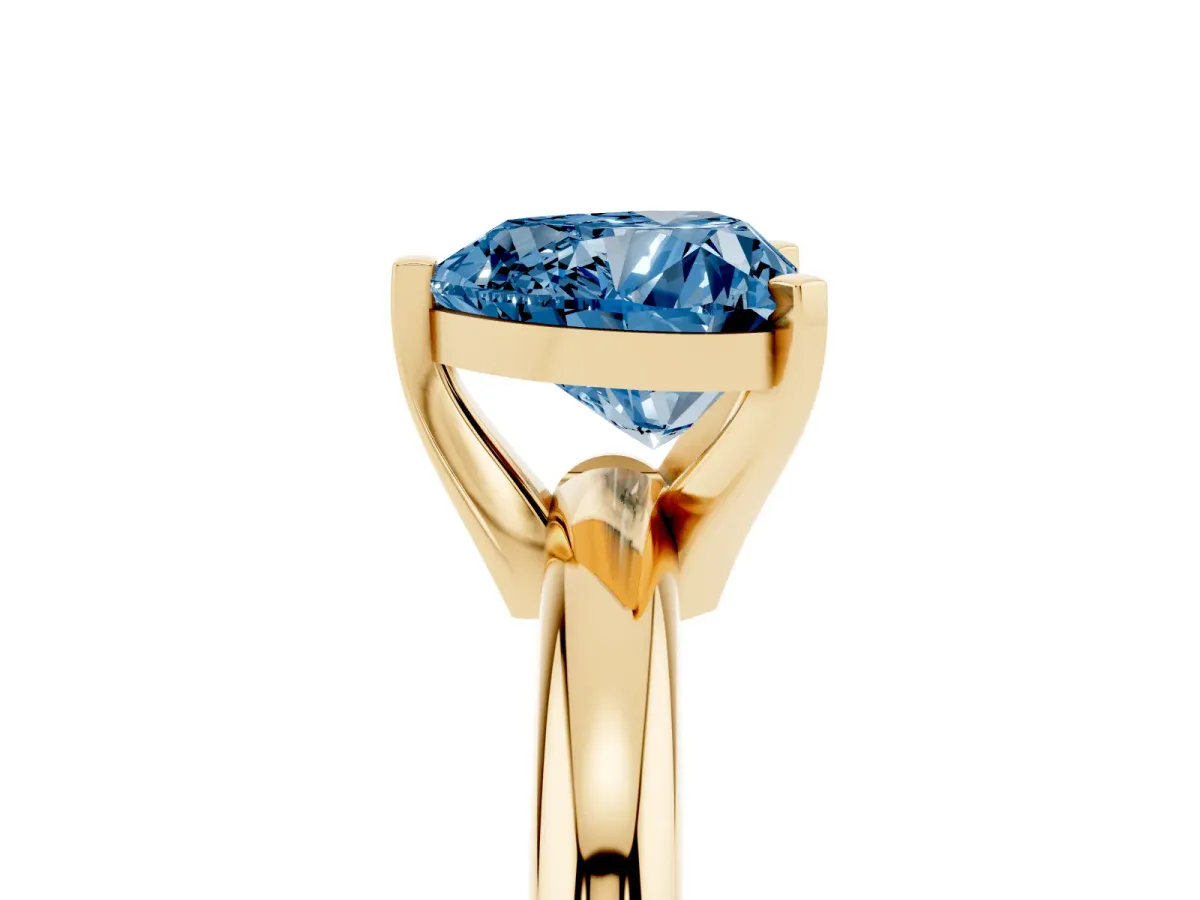 Fancy Blue Heart Cut Diamond Solitaire Engagement Ring with Round Band and Four-Prong Setting Yellow gold