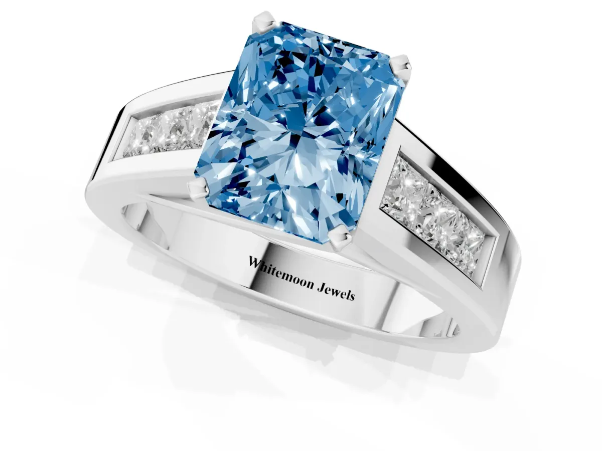Fancy Blue Radiant Cut Cut Channel Set Solitaire Ring with Four-Prong Setting Silver