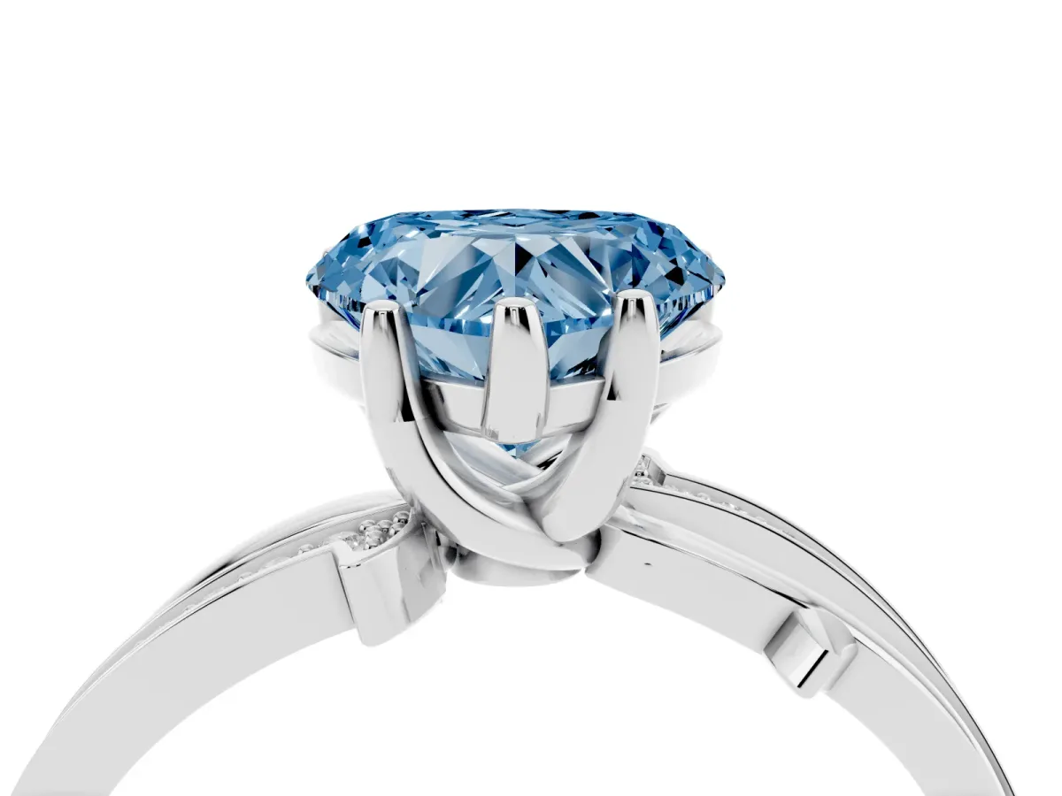 Fancy Blue Heart Cut Solitaire Twist Band with Pavé Accents and Four-Prong Setting Silver