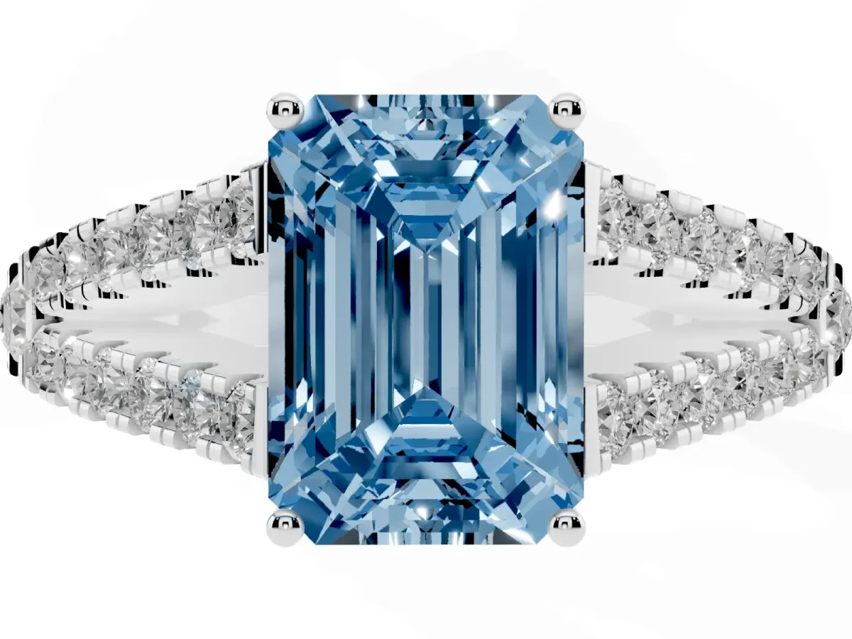 Fancy Blue Emerald Cut Diamond Split Shank Engagement Ring with Round Pavé and Prong Setting Platinum