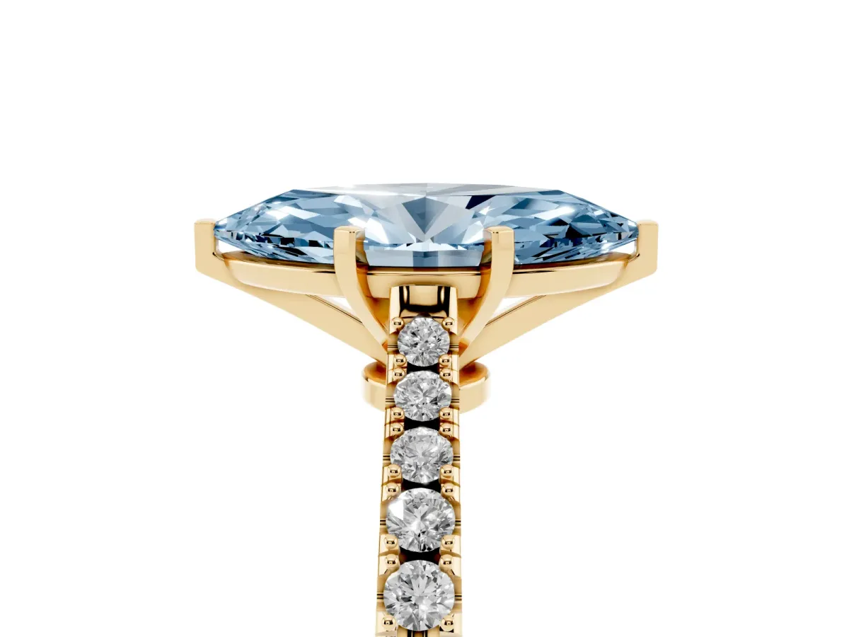 Fancy Blue Marquise Cut Cut Solitaire Diamond Engagement Ring with Pave Band and Four-Prong Setting Yellow gold