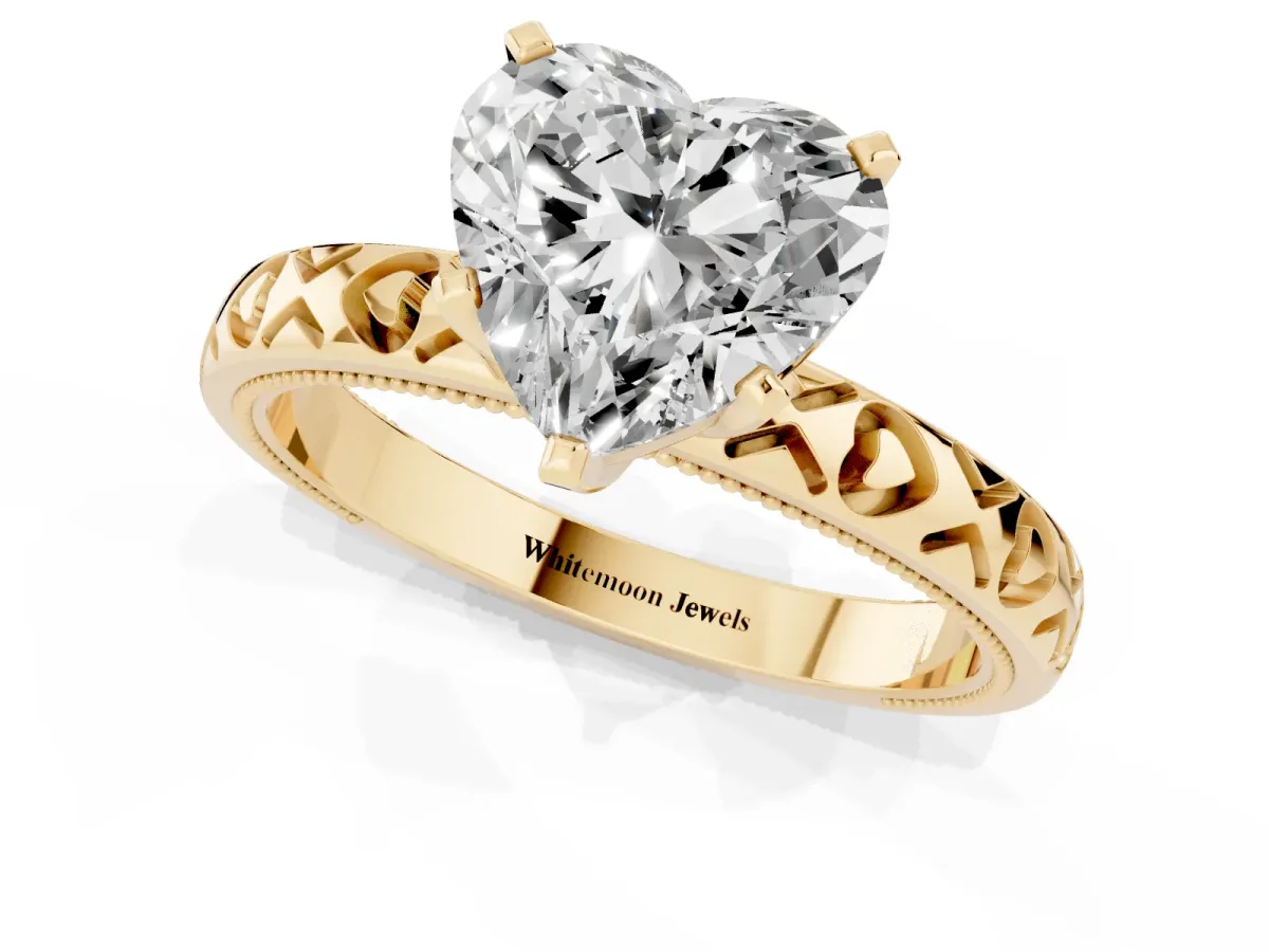 Heart Cut Solitaire Diamond Engagement Ring with XO Engraved Band and Four-Prong Setting Yellow gold