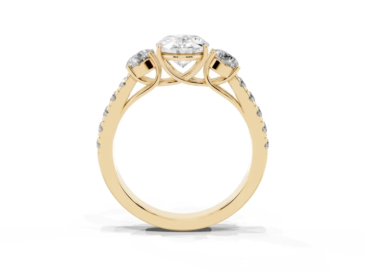 Oval Cut Cut Diamond Three-Stone Ring with Round Side Stones and Pavé Band Yellow gold