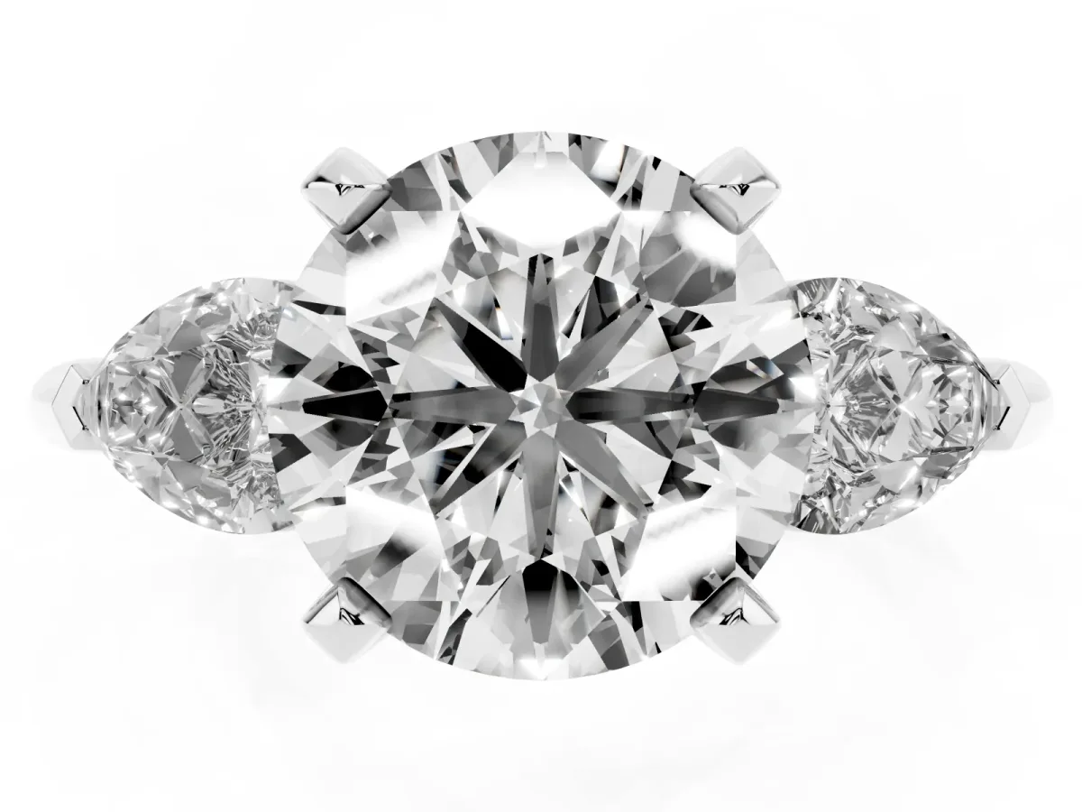 Three-Stone Round Cut Diamond Ring with Pear Side Stones and Four-Prong Setting Silver