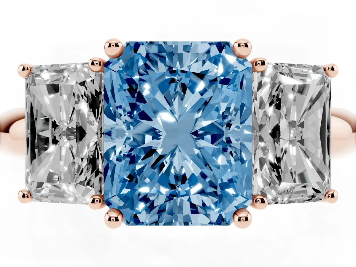 Fancy Blue Three-Stone Radiant Cut Cut Diamond Engagement Ring with Prong Setting on a White Gold Band Rose gold