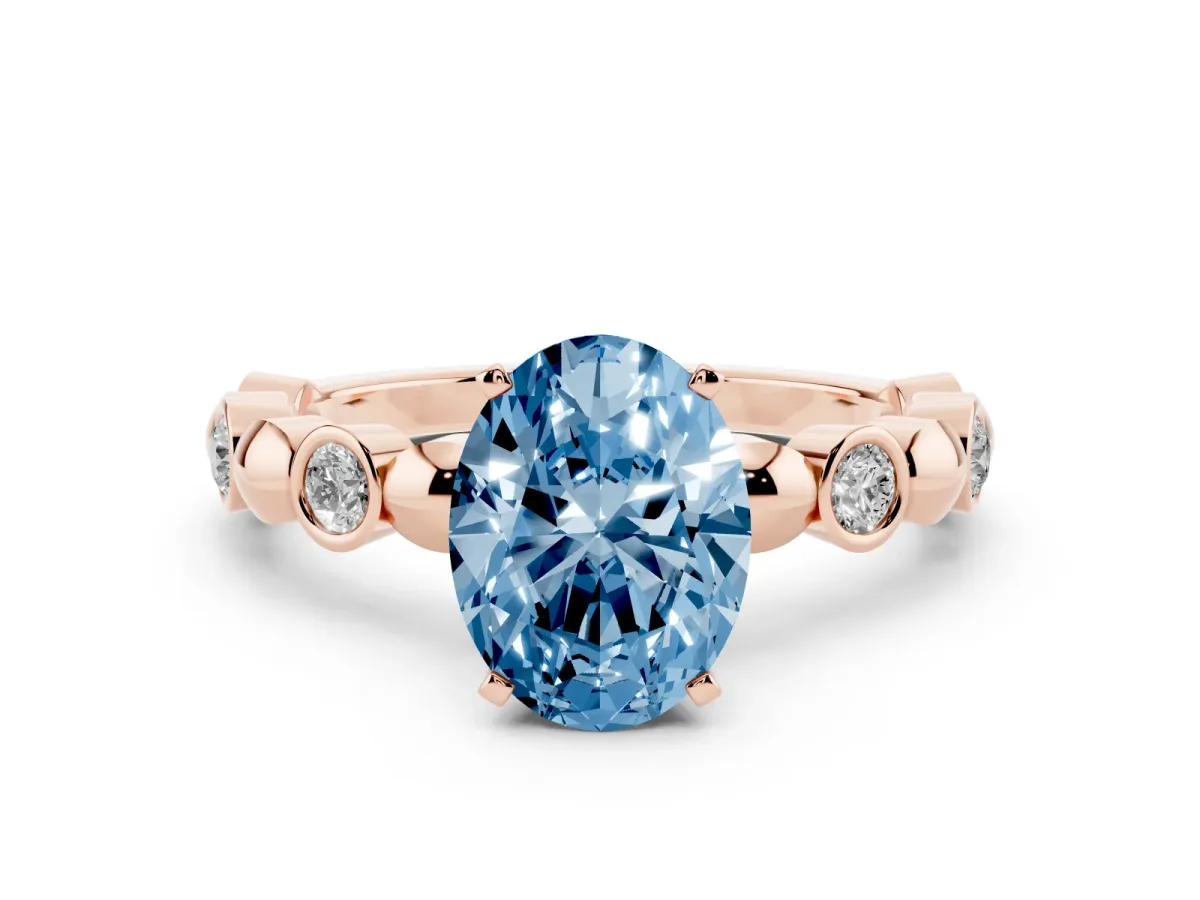 Fancy Blue Oval Cut Solitaire Bezel-Set Diamond Ring with Beaded Band and Four-Prong Setting Rose gold