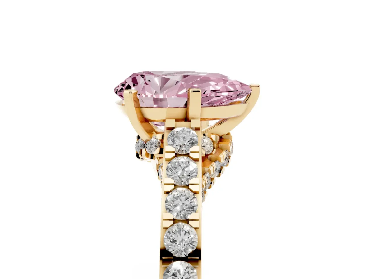 Fancy Pink Pear Cut Diamond Solitaire Ring with Crossover Gallery and Round Pavé Band Yellow gold
