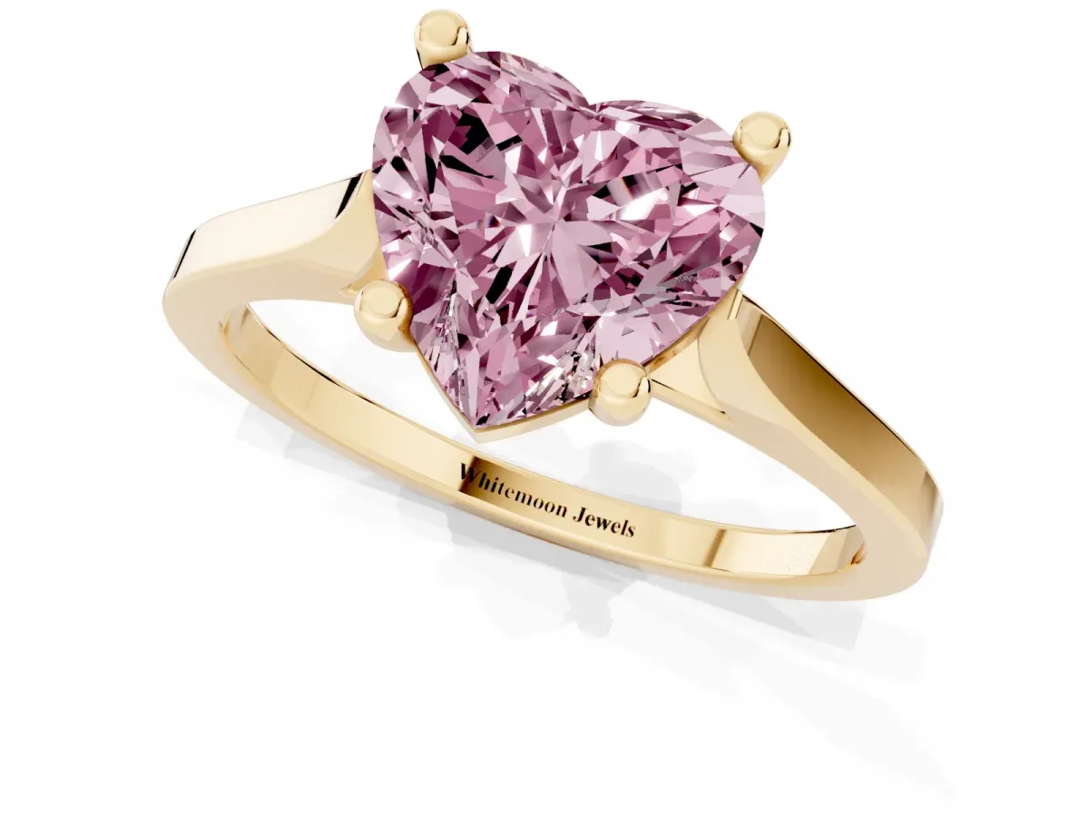 Fancy Pink Heart Cut Solitaire Diamond Ring with Four-Prong Setting and Tapered Band Yellow gold