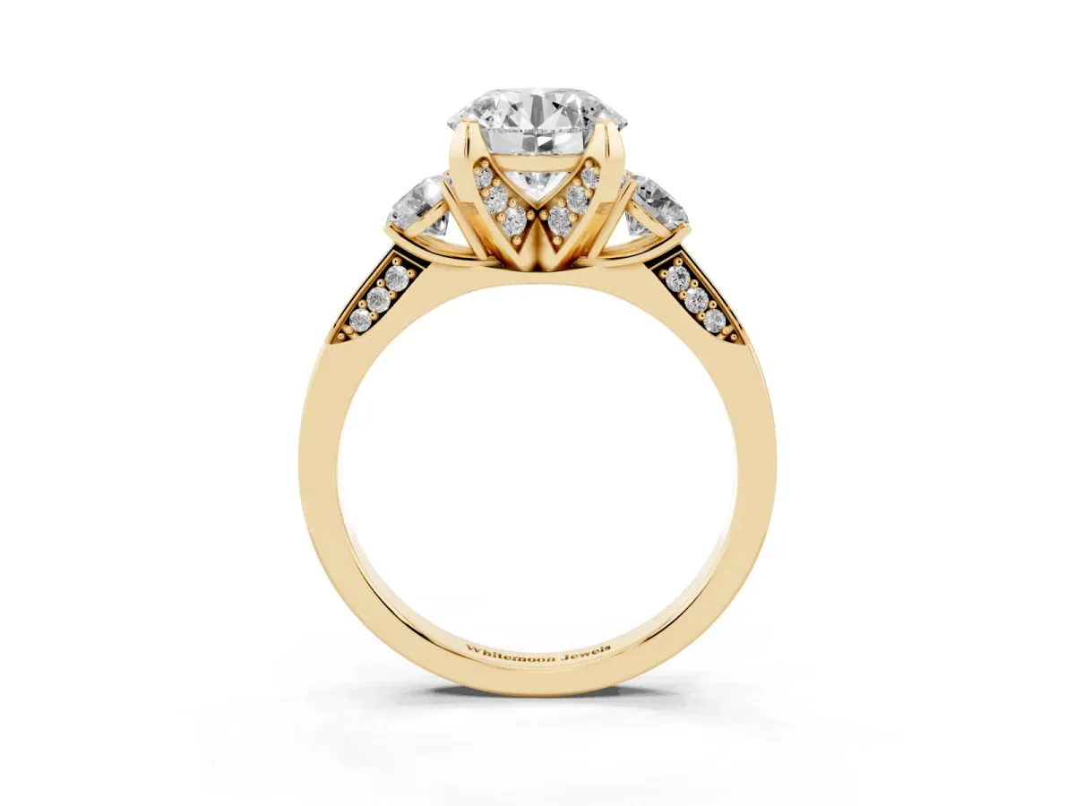 Round Cut Brilliant Three-Stone Diamond Ring with Pavé Band and Four-Prong Setting Yellow gold