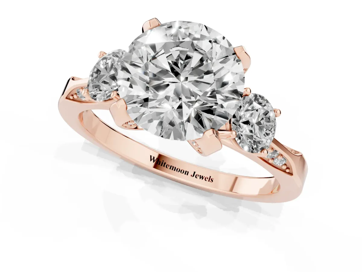 Round Cut Brilliant Three-Stone Diamond Ring with Pavé Band and Four-Prong Setting Rose gold