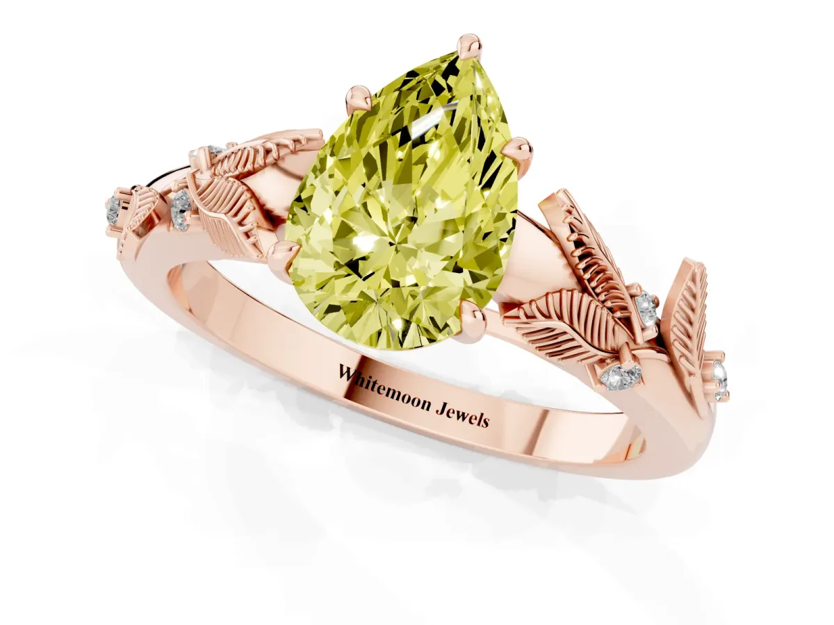 Fancy Yellow Pear Cut Diamond Solitaire Ring with Leaf Motif Band and Four-Prong Setting Rose gold