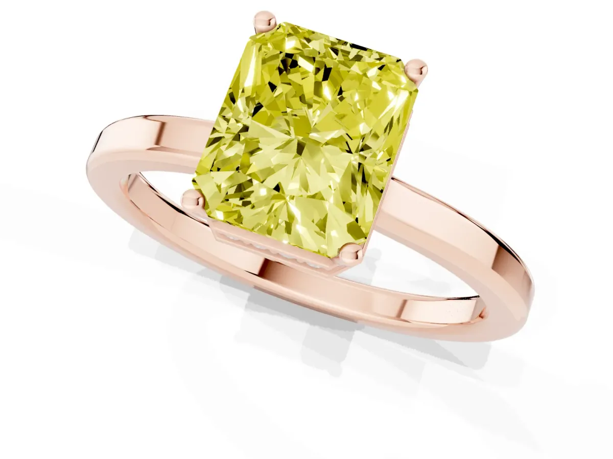 Fancy Yellow Radiant Cut Cut Solitaire Engagement Ring with Four-Prong Setting on a Classic Band Rose gold
