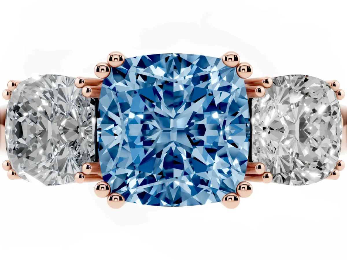 Fancy Blue Three-Stone Cushion Cut Cut Diamond Ring with Channel Set Band and Four-Prong Setting Rose gold