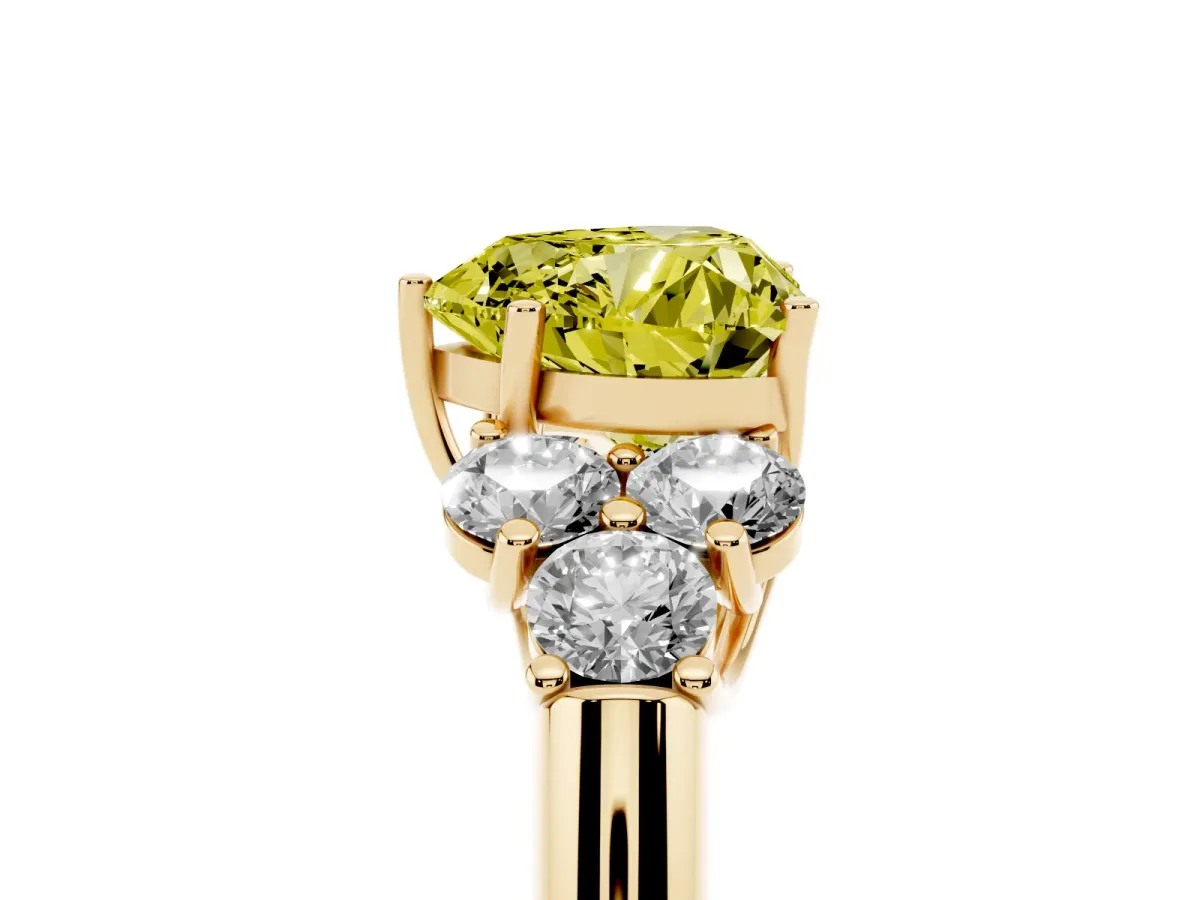 Fancy Yellow Heart Cut Cut Diamond Cluster Ring with Round Accent Stones and Prong Setting on a Classic Band Yellow gold