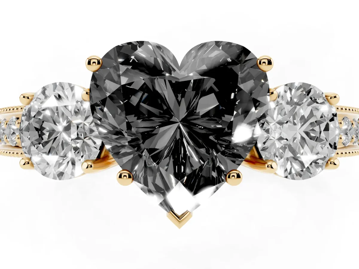 Fancy Black Heart Cut Three-Stone Diamond Ring with Pavé Band and Four-Prong Setting Yellow gold