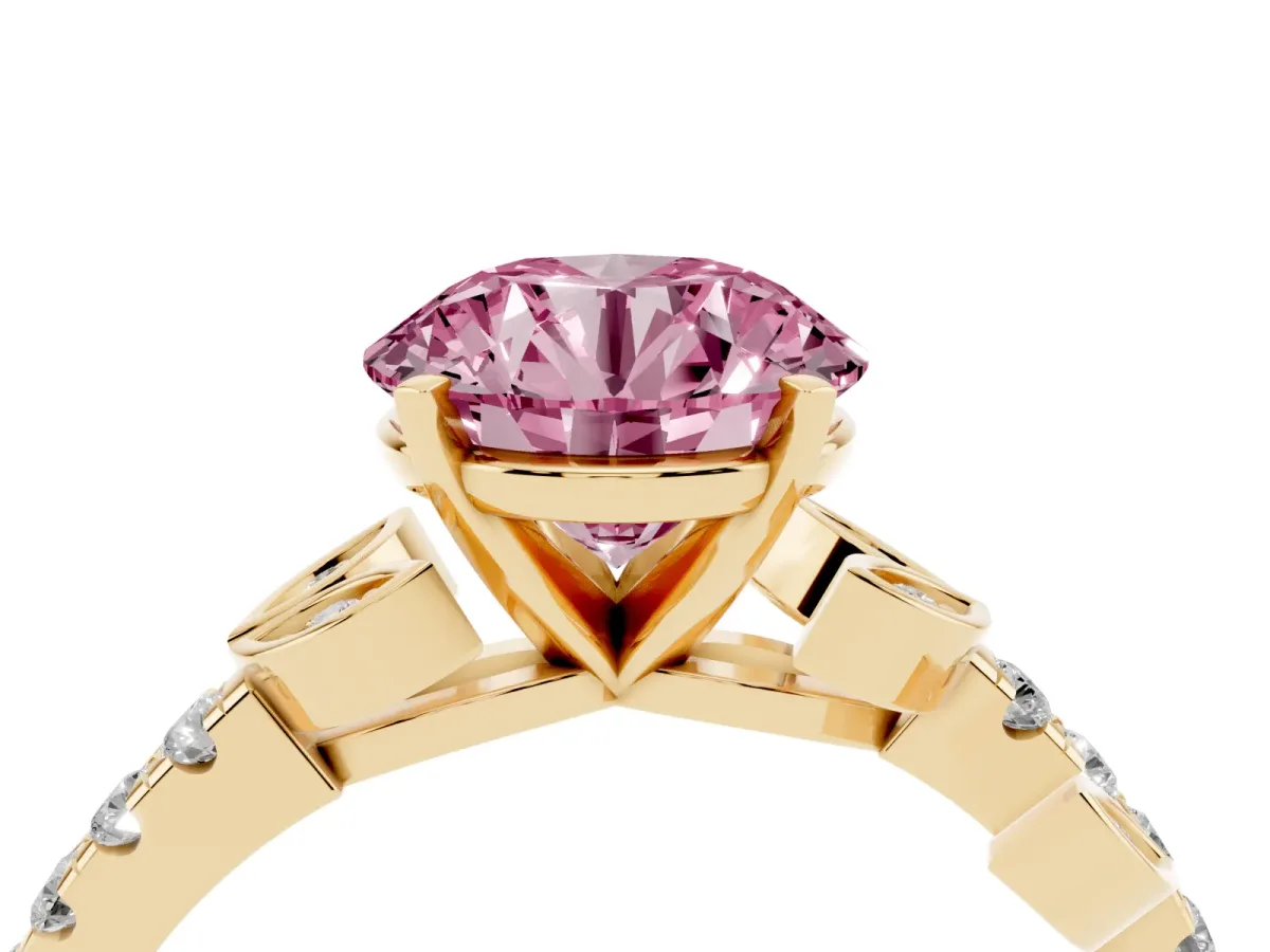 Fancy Pink Round Cut Solitaire Leaf-Inspired Diamond Ring with Pavé Band and Four-Prong Setting Yellow gold