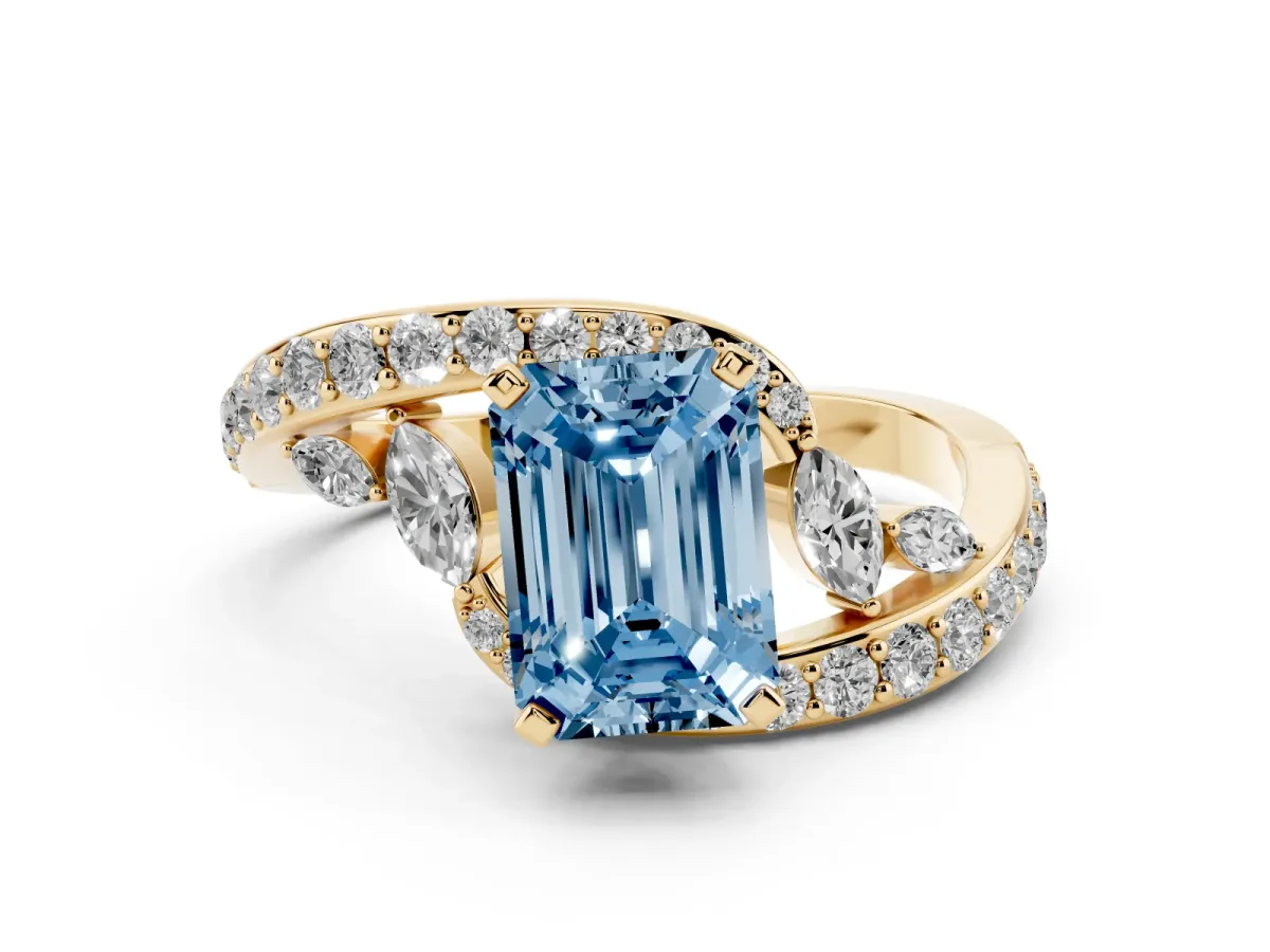 Fancy Blue Emerald Cut Solitaire with Pavé Twist Band and Four-Prong Setting Yellow gold