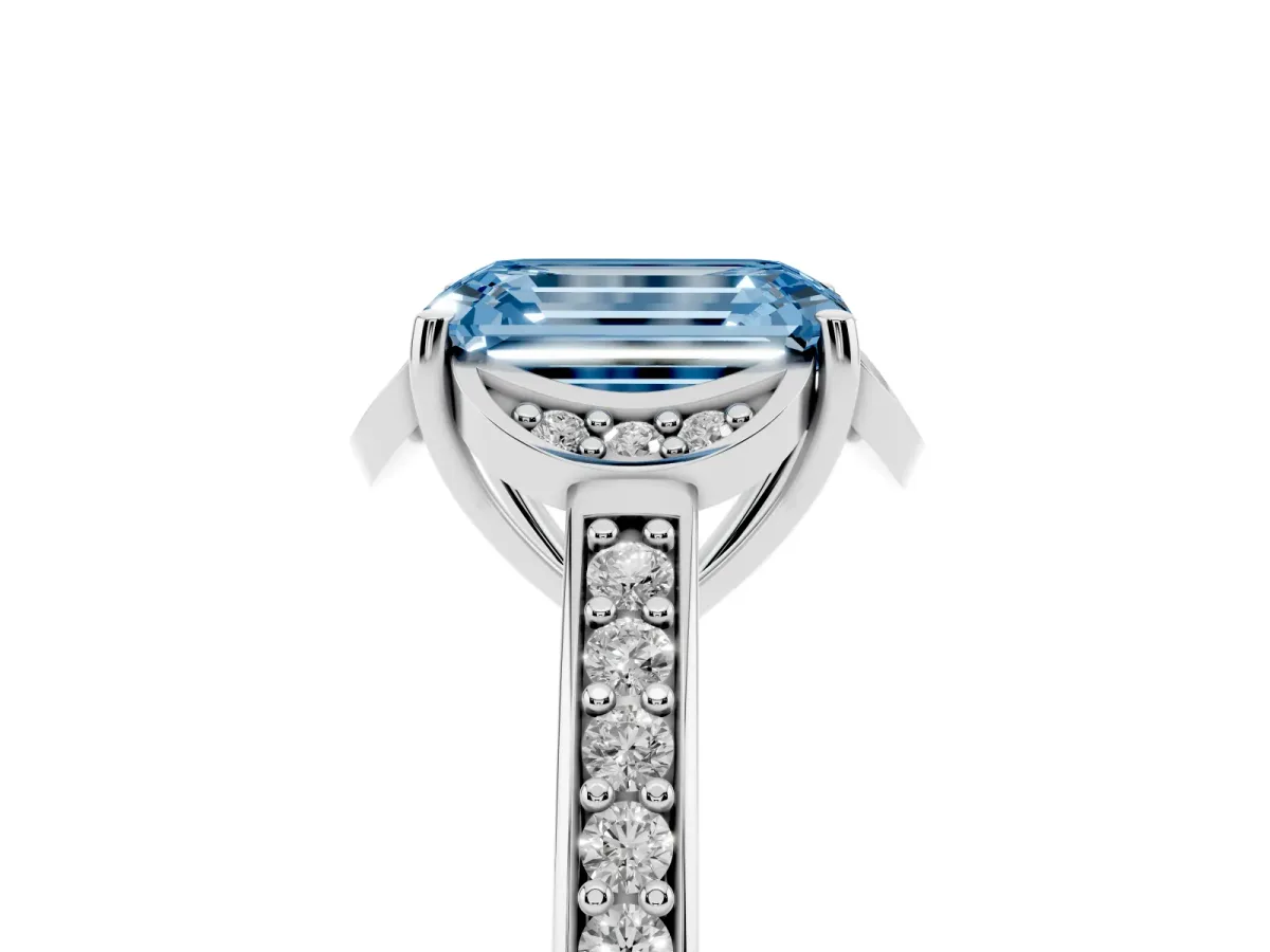 Fancy Blue Emerald Cut Cut Halo Diamond Ring with Channel Set Band and Four-Prong Setting Silver