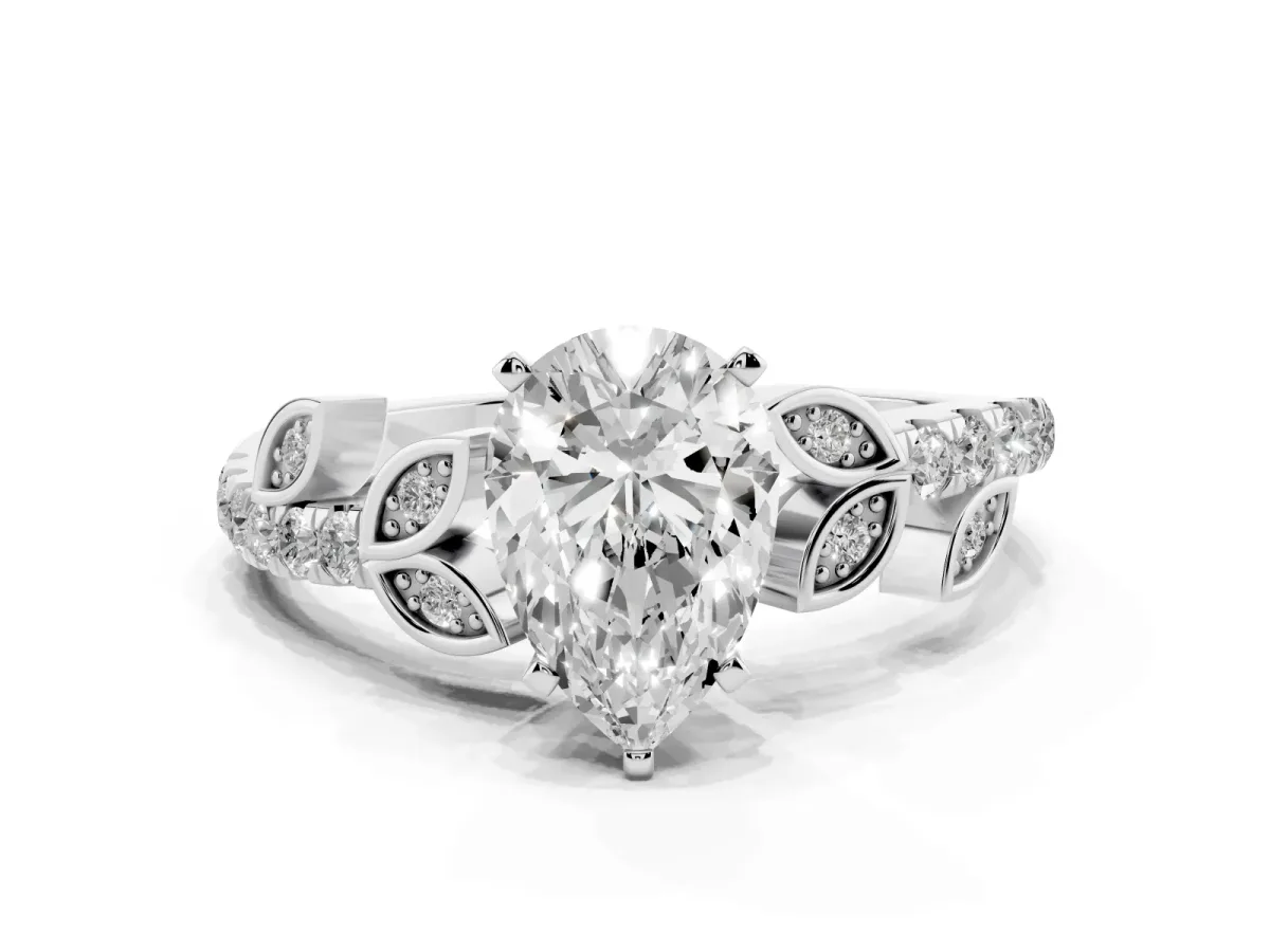 Pear Cut Solitaire Leaf-Inspired Diamond Ring with Pavé Band and Four-Prong Setting Silver